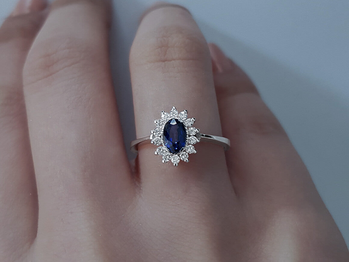 Diamond and oval sapphire jewelry set in 14 K white gold