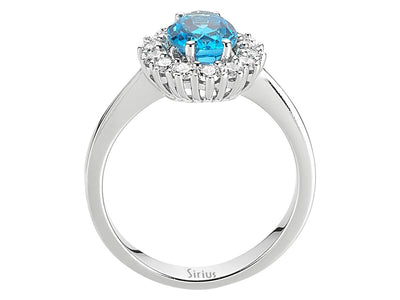 Diamond and Oval Blue Topaz Ring in 14 K White Gold
