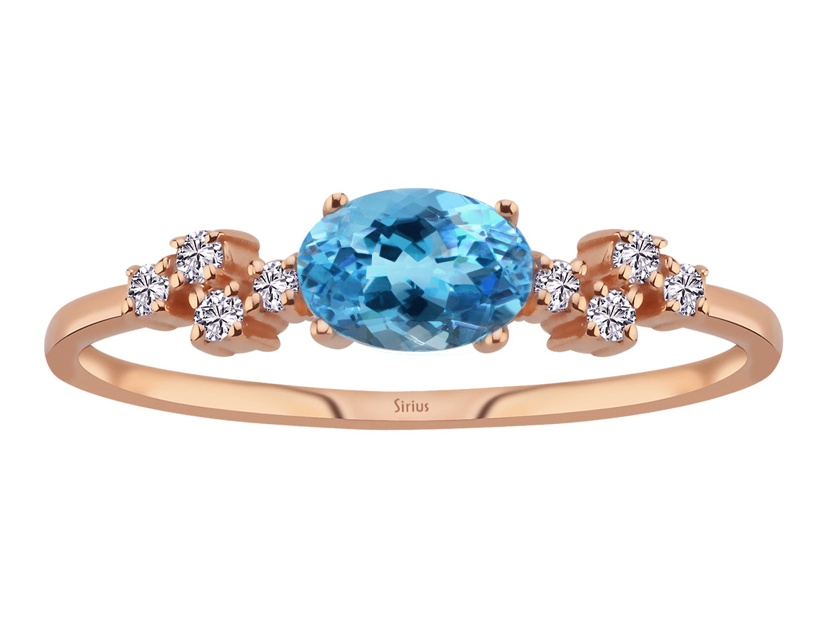 Aquala Ring mit Diamanten und ovalem blauem Topas - handgefertigter Diamantschmuck aus Feingold | Sirius Diamant