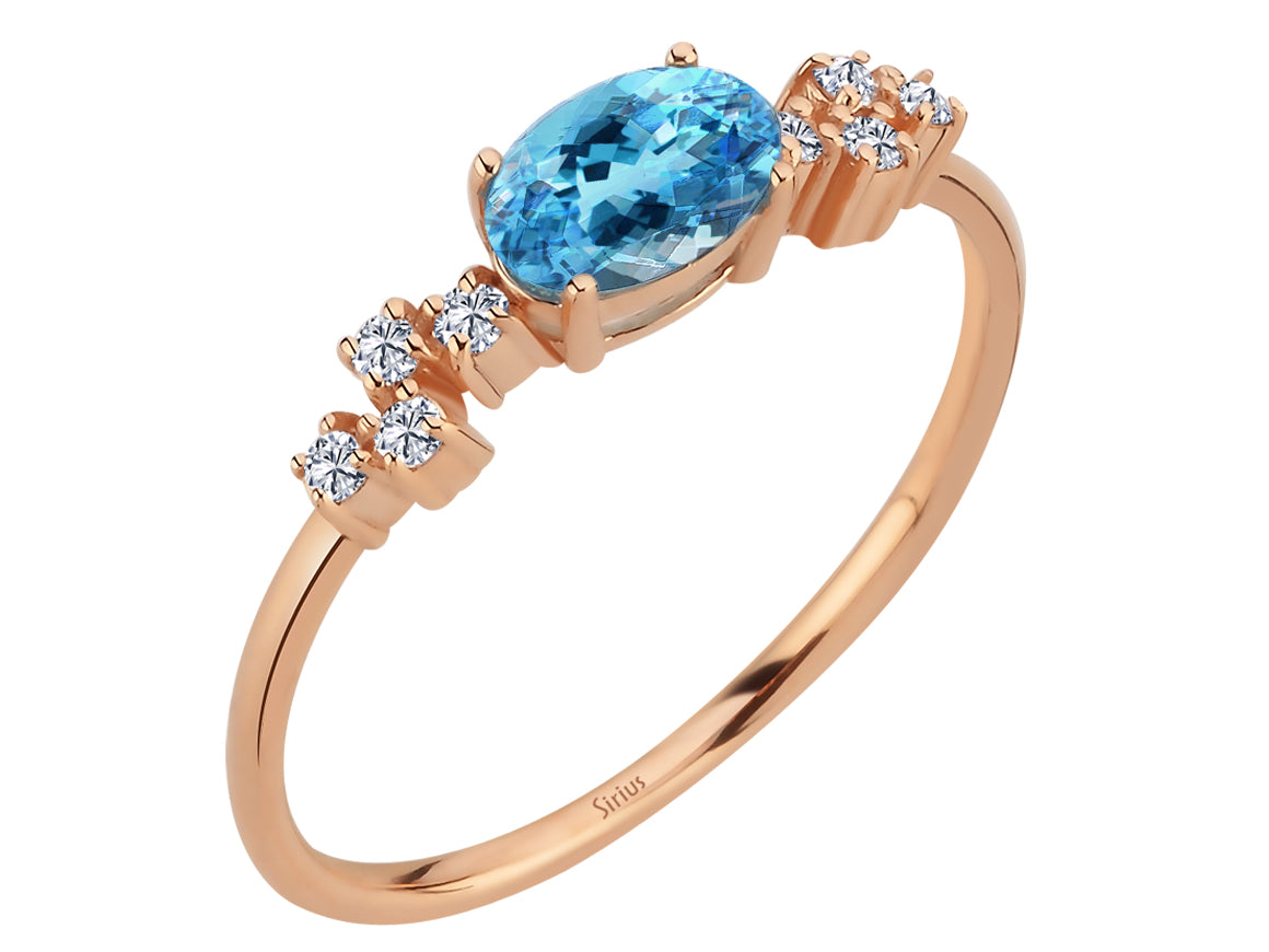 Aquala Ring mit Diamanten und ovalem blauem Topas - handgefertigter Diamantschmuck aus Feingold | Sirius Diamant