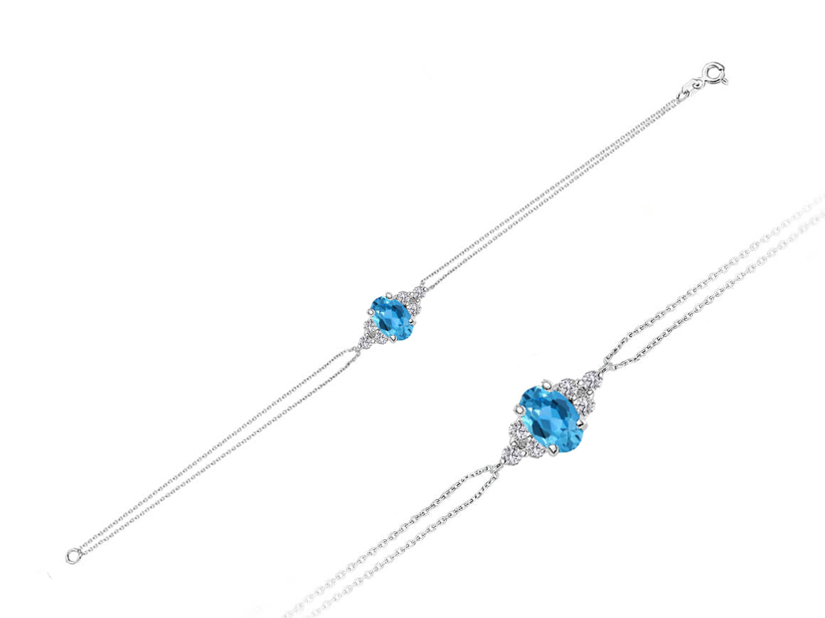 Bracelet with diamonds and oval blue topaz