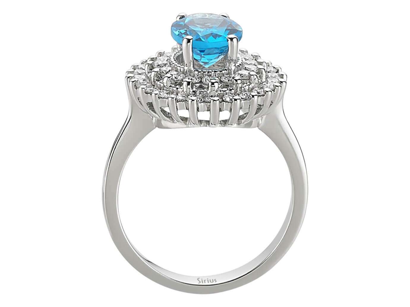 Diamond and oval blue topaz ring in 14 K white gold