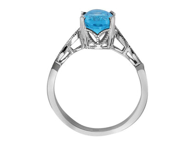 Diamond and Oval Blue Topaz Ring