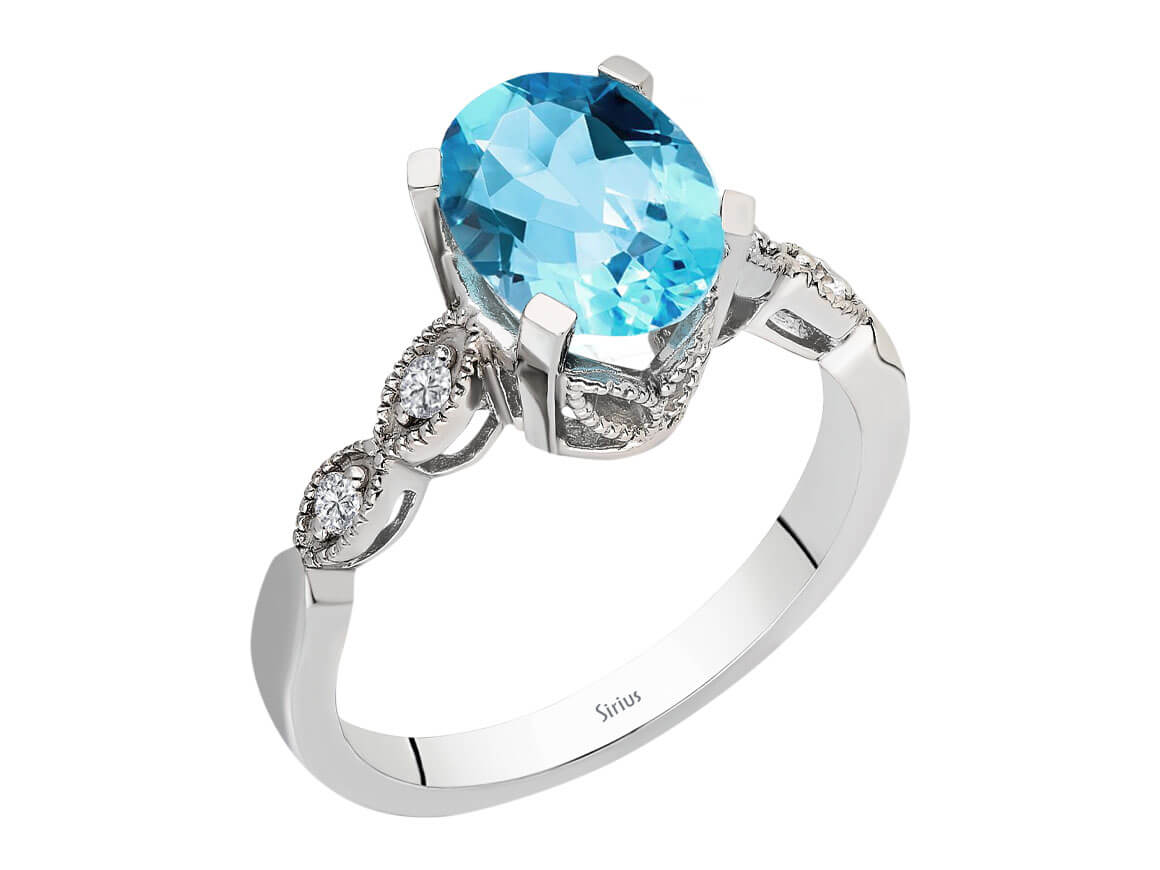 Diamant und Oval Blauer Topas Ring - handgefertigter Diamantschmuck aus Feingold | Sirius Diamant