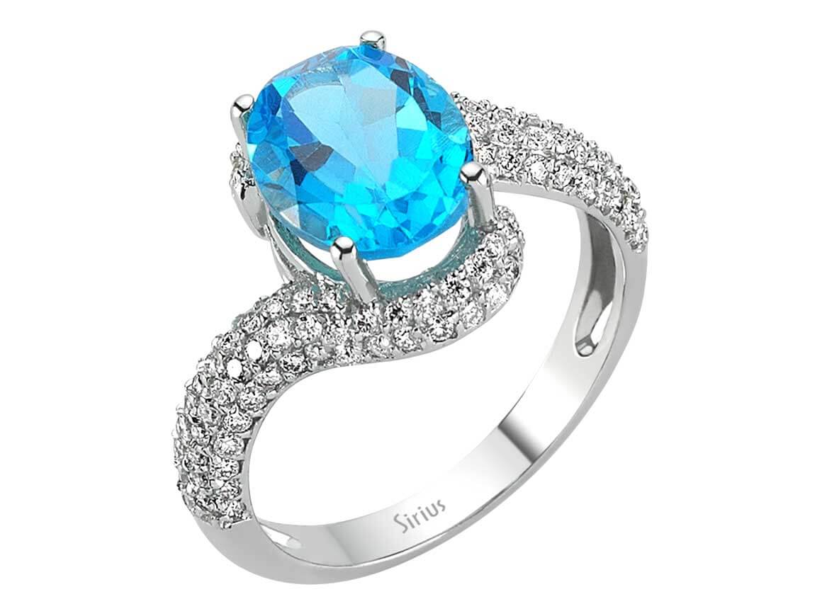 Diamant und Oval Blauer Topas Ring - handgefertigter Diamantschmuck aus Feingold | Sirius Diamant