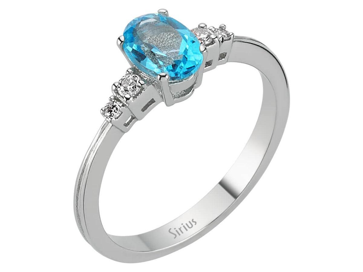 Diamant und Oval Blauer Topas Ring - handgefertigter Diamantschmuck aus Feingold | Sirius Diamant