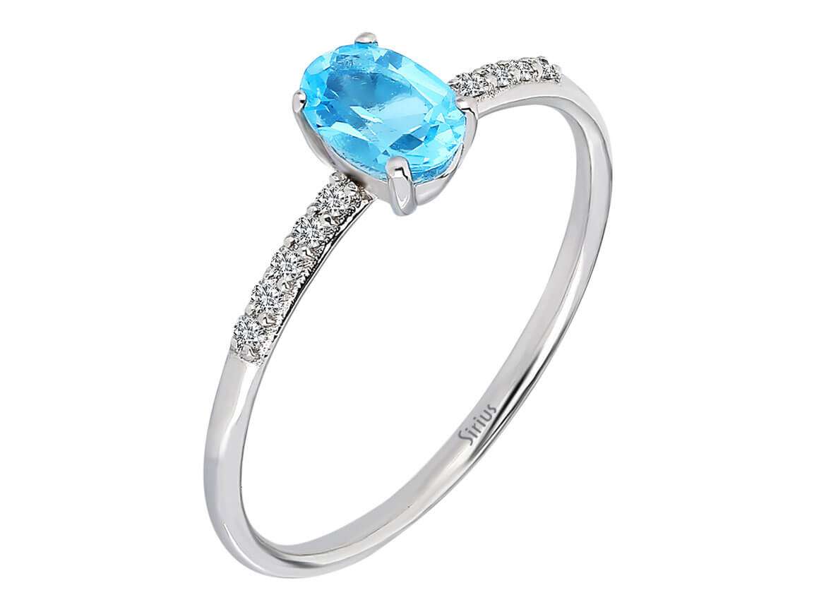 Diamond and Oval Blue Topaz Ring