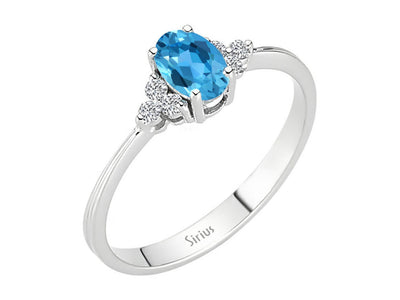 Diamond and blue topaz ring in 8 K white gold
