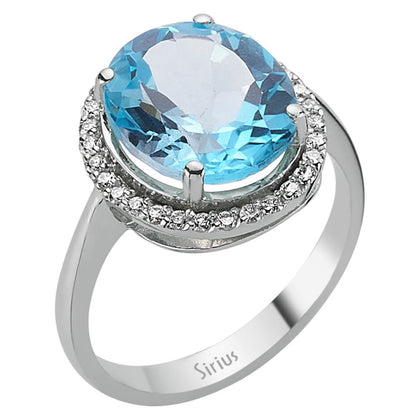 Diamond and Oval Blue Topaz Ring