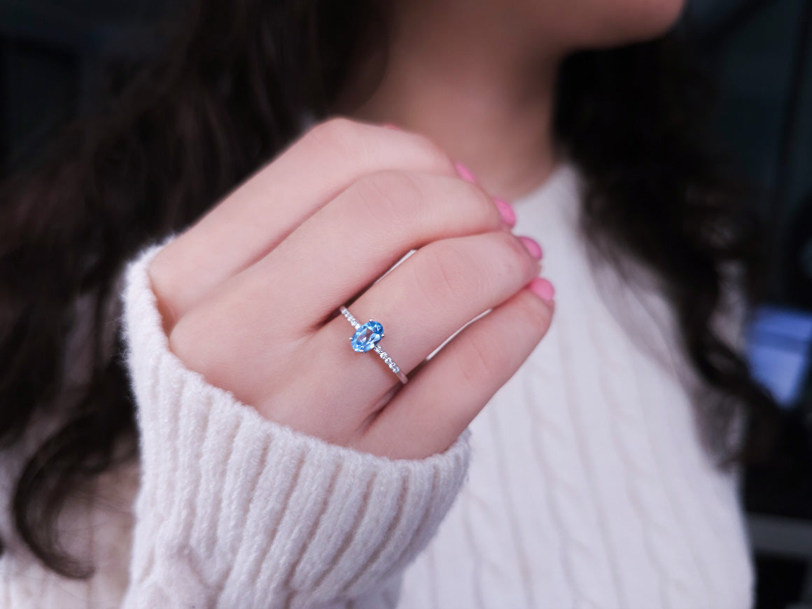 Diamond and Oval Blue Topaz Ring
