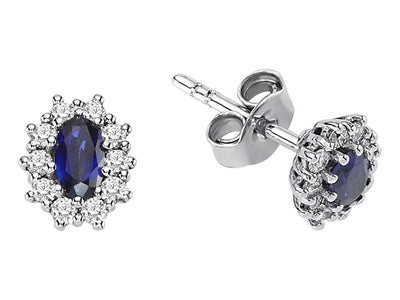 Diamond and oval sapphire earrings in 333 8K white gold