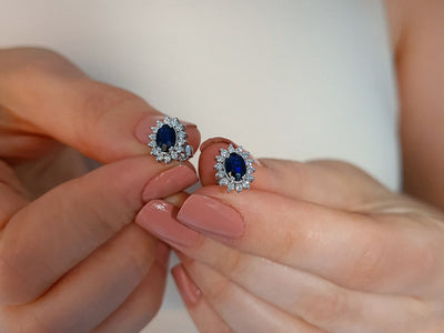 Diamond and oval sapphire jewelry set in 14 K white gold