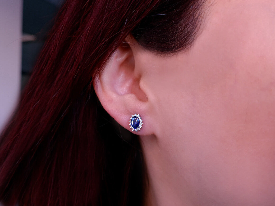 Diamond and oval sapphire stud earrings