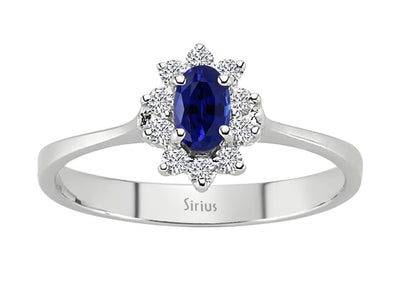 Diamond and oval sapphire ring in 14 K white gold
