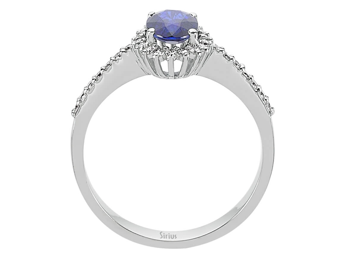 Diamond and oval sapphire ring in 14 carat white gold