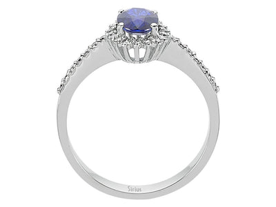 Diamond and oval sapphire ring in 14 carat white gold