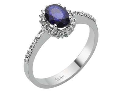 Diamond and oval sapphire ring in 14 carat white gold