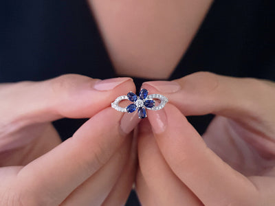 Diamond and oval-cut sapphire violet ring in 333 8-carat white gold