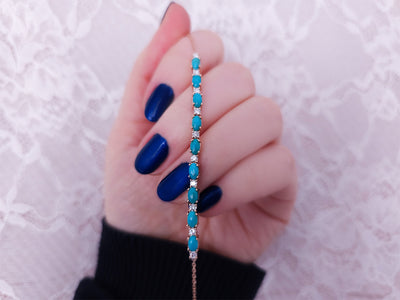 Diamond and oval turquoise bracelet in 14 K rose gold