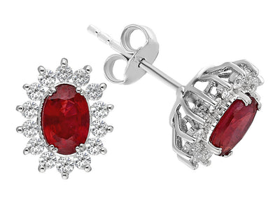 Diamond and oval cut ruby jewelry set in 14 carat white gold
