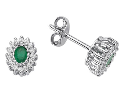 Diamond and oval emerald earrings in 333 8 carat gold