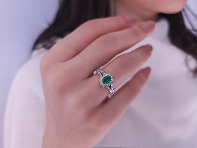 Diamond and Oval Emerald Ring