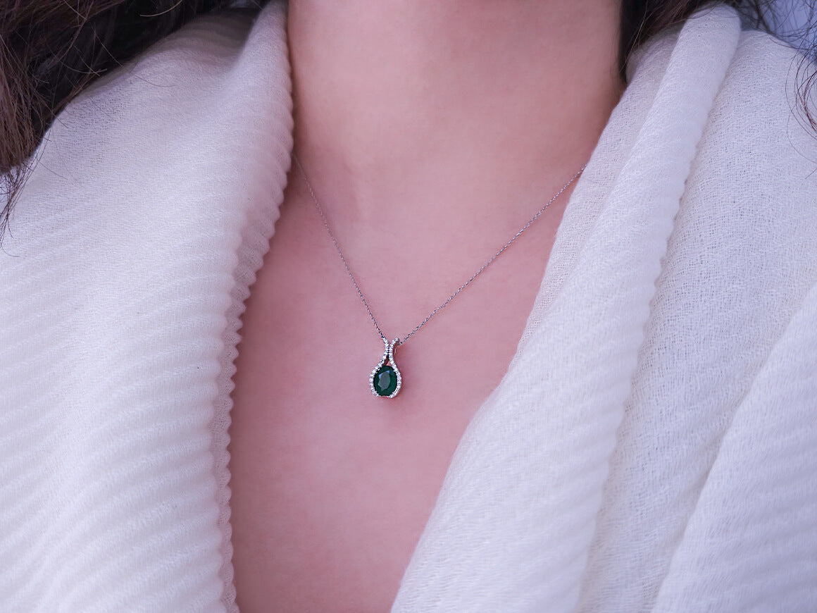 Diamond and oval emerald necklace