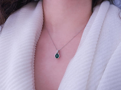 Diamond and oval emerald necklace