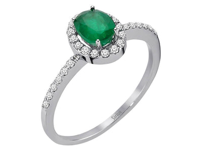 Diamond and oval emerald ring in 14 K white gold
