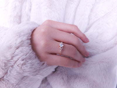 Princess-cut white sapphire ring with diamonds