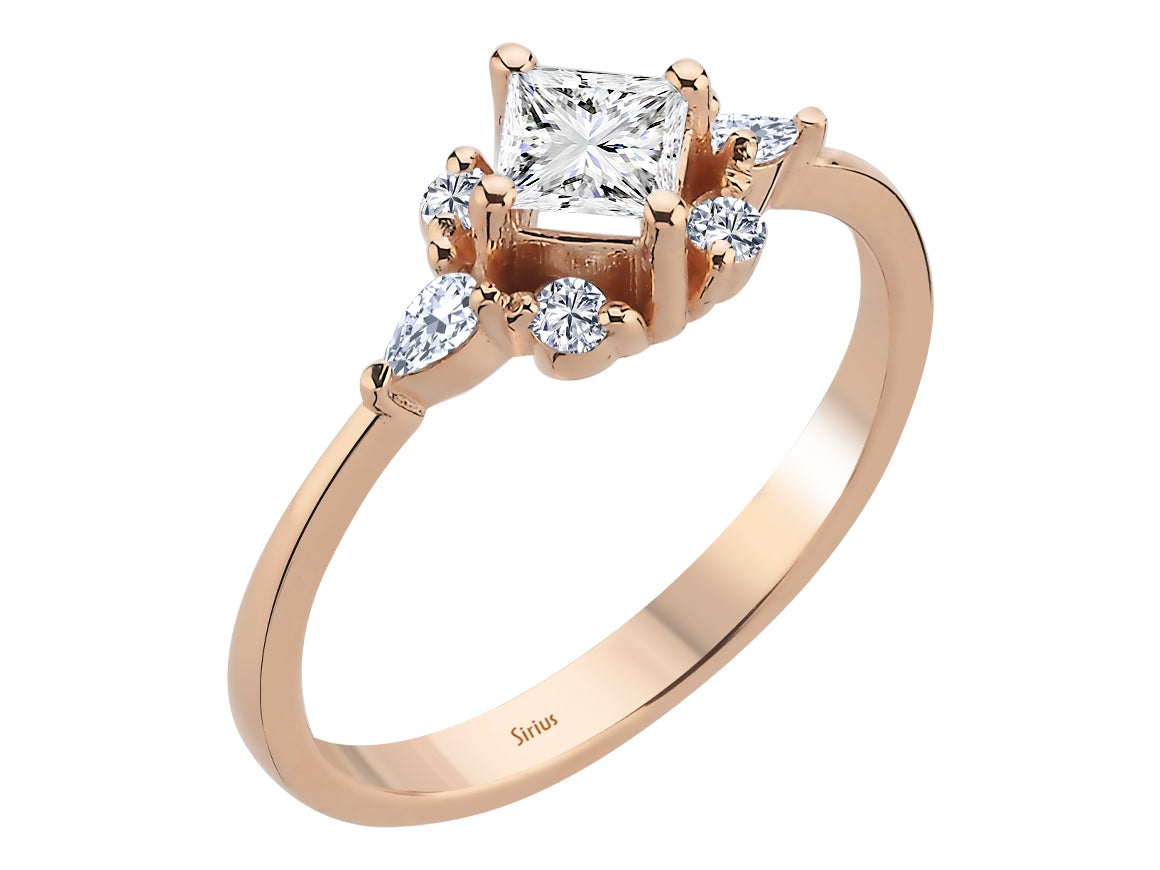 Ring mit Diamanten und weißem Topas im Prinzess-Schliff - handgefertigter Diamantschmuck aus Feingold | Sirius Diamant