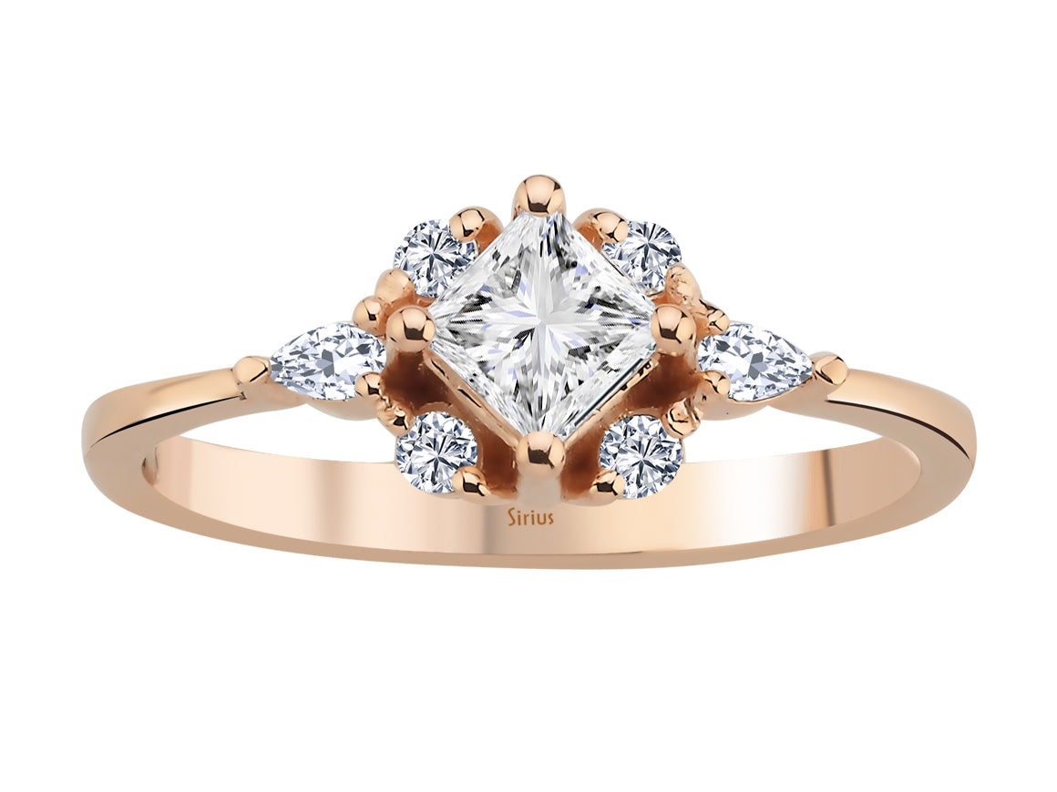 Ring mit Diamanten und weißem Topas im Prinzess-Schliff - handgefertigter Diamantschmuck aus Feingold | Sirius Diamant