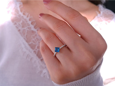 Diamond and Princess London Blue Topaz Ring