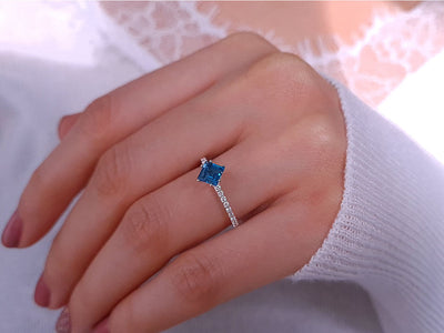 Diamond and Princess London Blue Topaz Ring