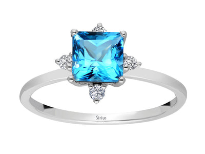 Diamond and Princess Blue Topaz Ring