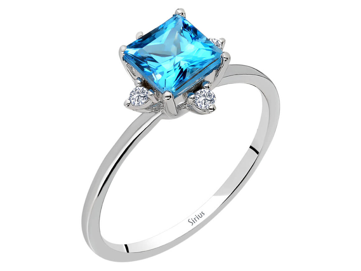 Diamond and Princess Blue Topaz Ring