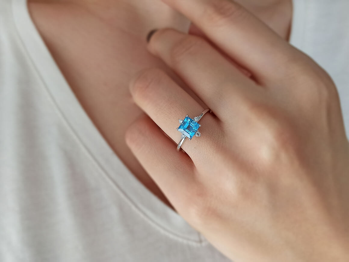 Diamond and Princess Blue Topaz Ring