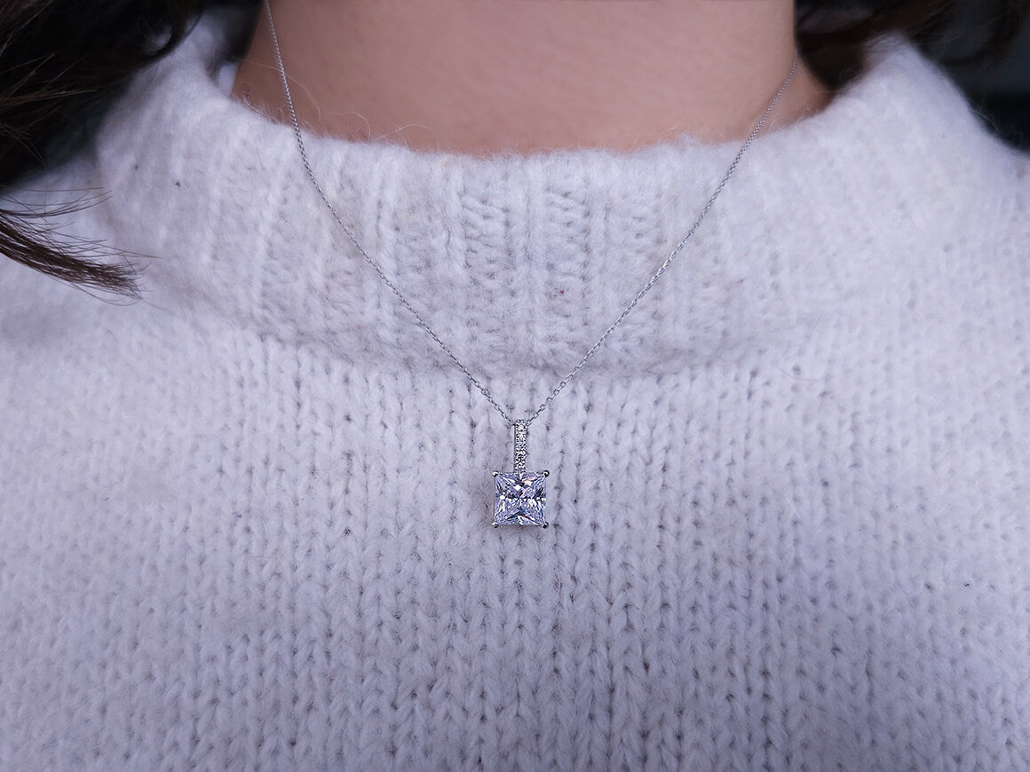 Diamond and radiant-cut white topaz solitaire necklace