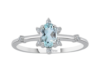 Ice crystal ring with diamond and sky blue topaz