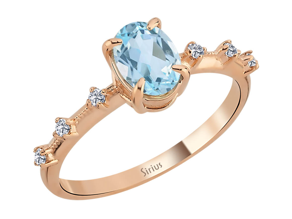 Elena-Ring mit Diamanten und skyblauen Topas-Steinen - handgefertigter Diamantschmuck aus Feingold | Sirius Diamant
