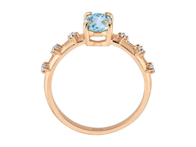 Elena ring with diamonds and sky blue topaz stones