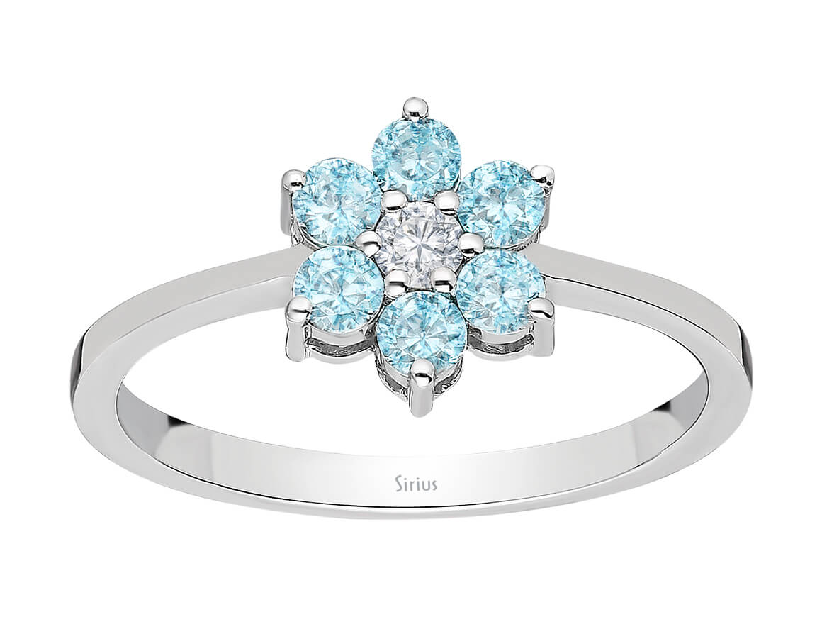 Diamant und Blauer Topas Gänseblümchen Ring - handgefertigter Diamantschmuck aus Feingold | Sirius Diamant