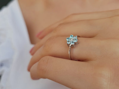 Diamond and Blue Topaz Daisy Ring