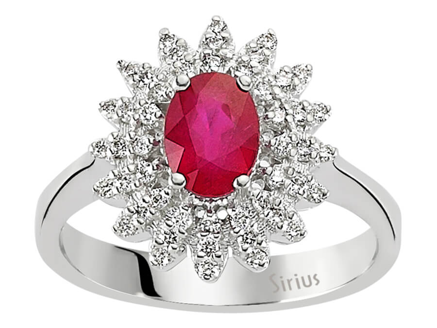 Diamond and oval ruby ring in 14 carat white gold