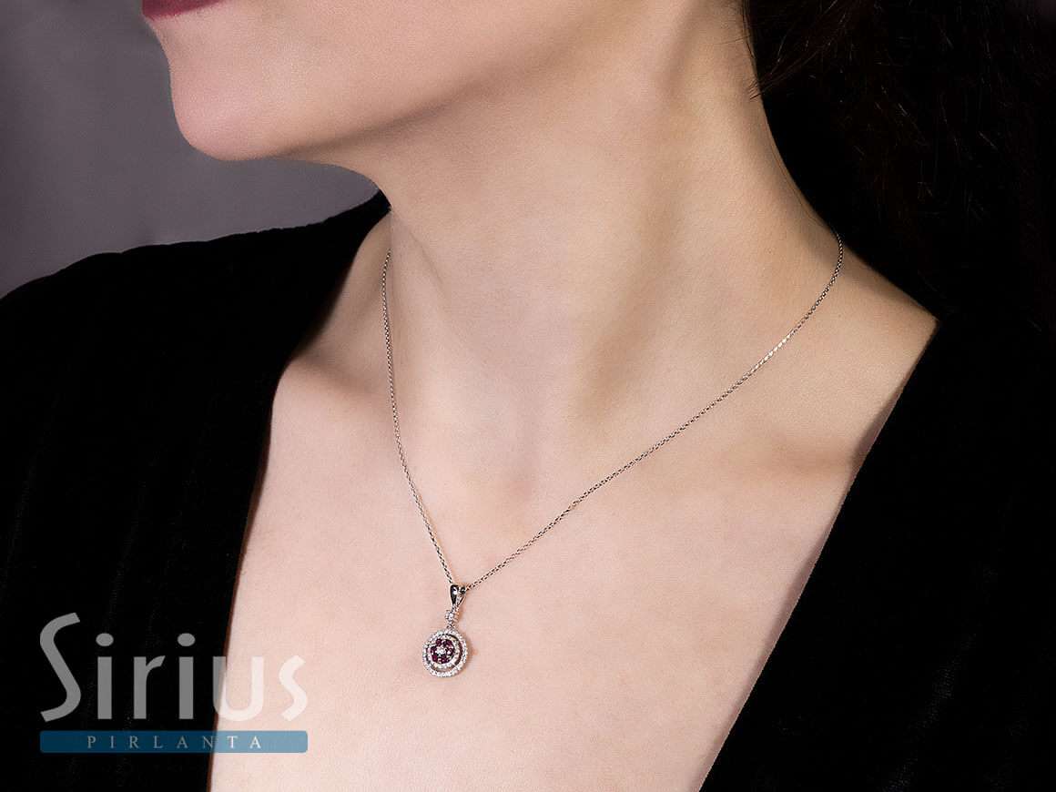 Two-row diamond and ruby flower necklace in 14 K white gold