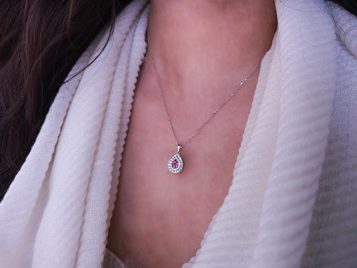 Two-row ruby and diamond necklace in 18 K white gold
