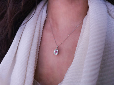 Two-row ruby and diamond necklace in 18 K white gold