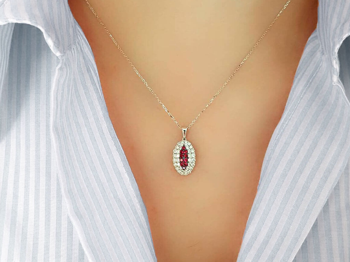 Two-row diamond and ruby necklace in 14 K white gold