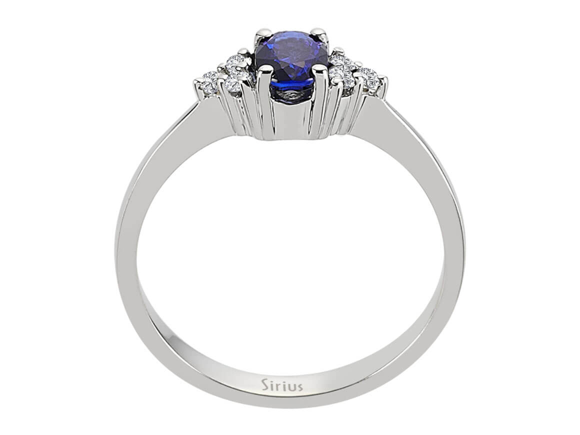 Diamond and oval sapphire ring in 333 8K white gold