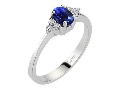 Diamond and oval sapphire ring in 333 8K white gold
